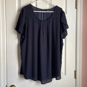 Navy blue polka dotted blouse with flowy short sleeve